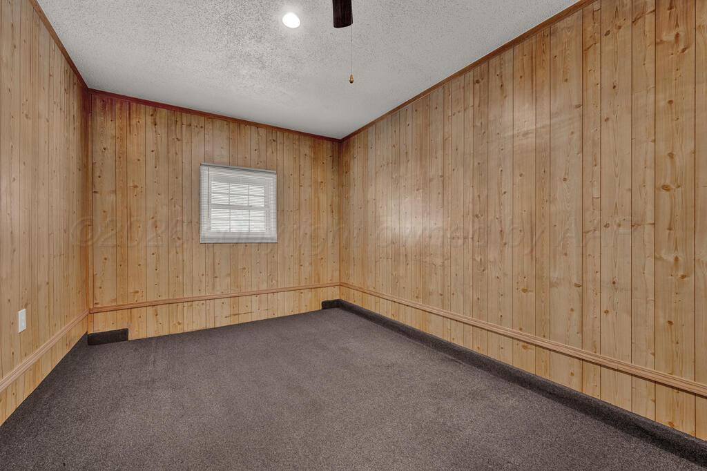 5025 South Crockett Street Amarillo, TX 79110 - Photo 6 of 30 a view of a livingroom with a window