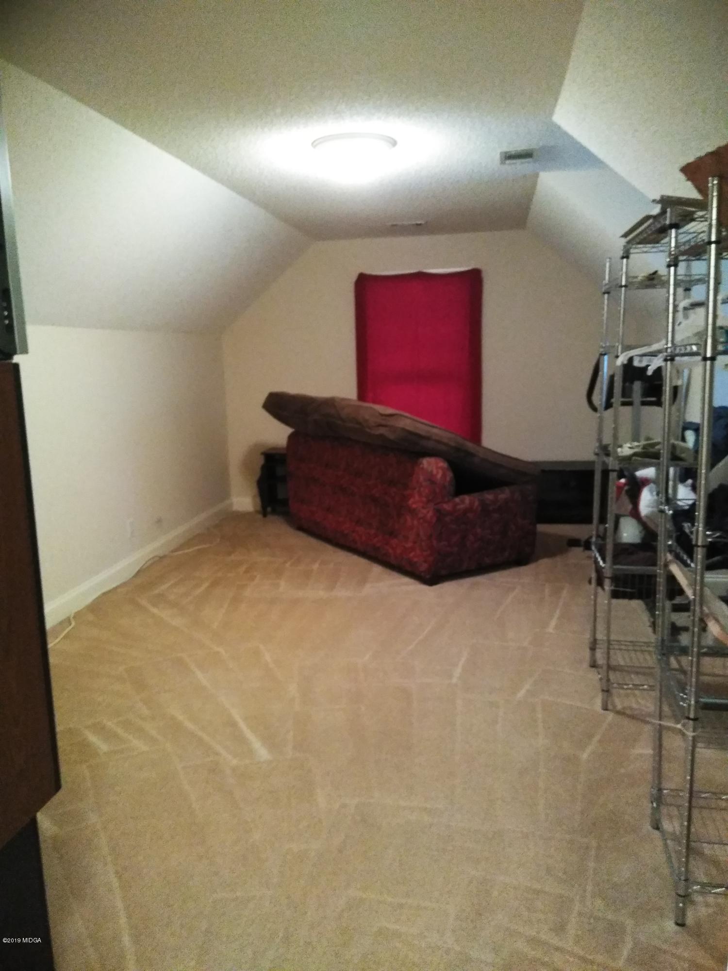 304 Browning Pointe Road Macon, GA 31216 - Photo 14 of 15 a room with furniture