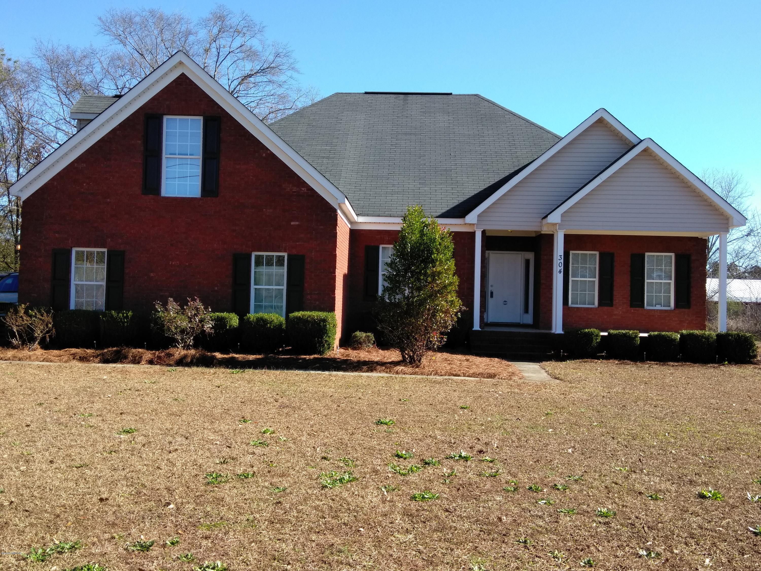 304 Browning Pointe Road Macon, GA 31216 - Photo 15 of 15 a front view of a house with a yard