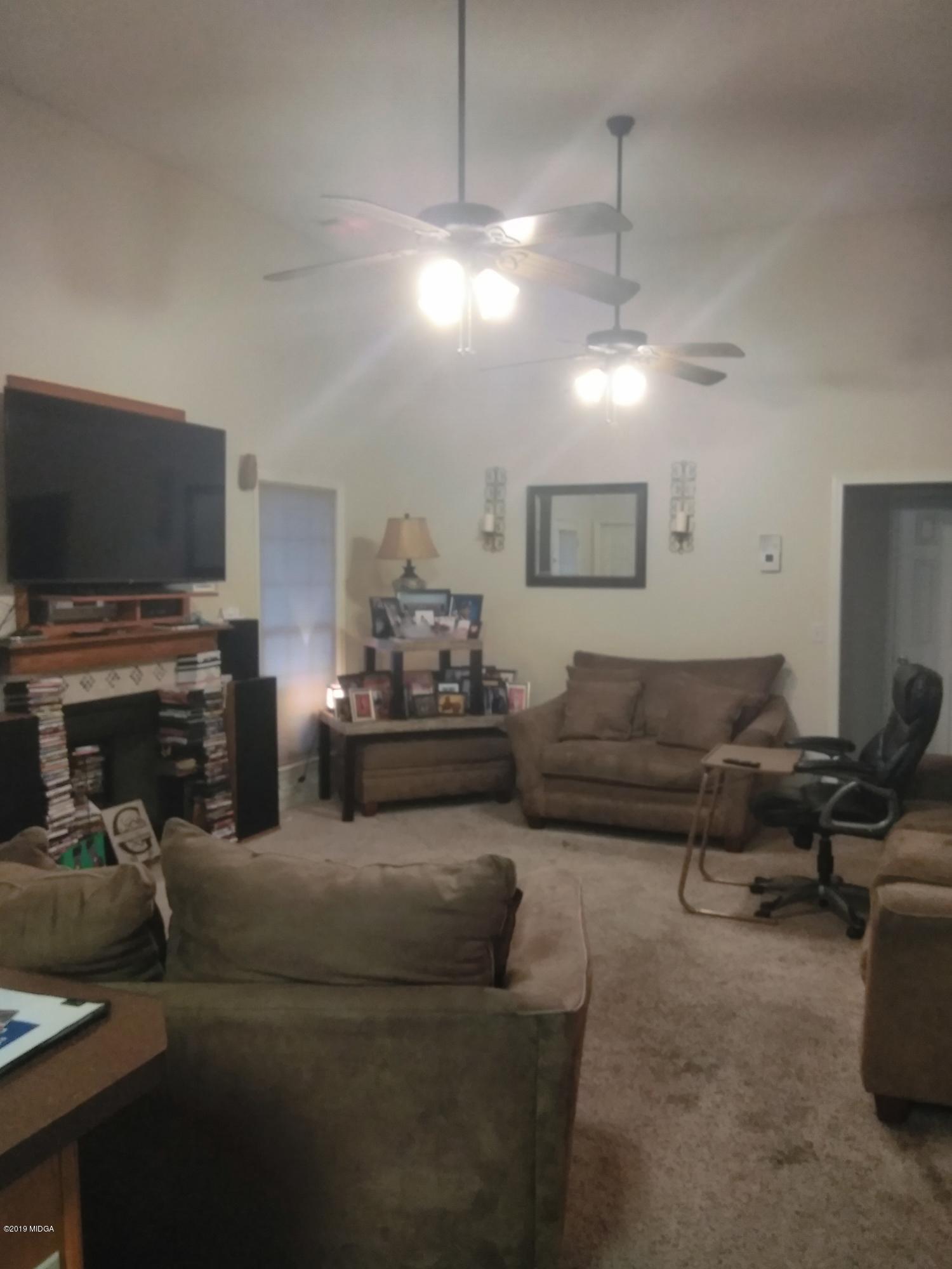 304 Browning Pointe Road Macon, GA 31216 - Photo 3 of 15 a living room with furniture and a flat screen tv