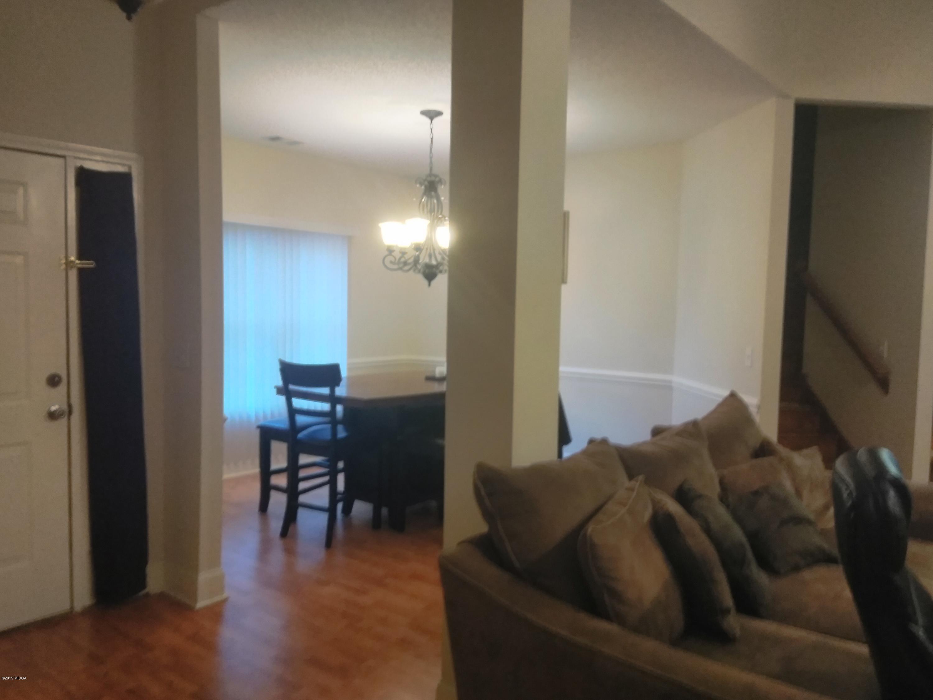 304 Browning Pointe Road Macon, GA 31216 - Photo 4 of 15 a living room with furniture and a flat screen tv