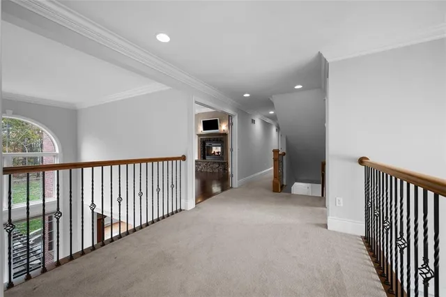 a view of a hallway with a livingroom