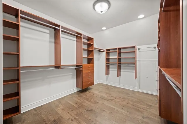 wooden floor in an empty room with an entryway
