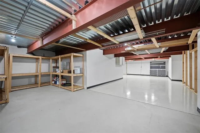 a view of a garage room with racks