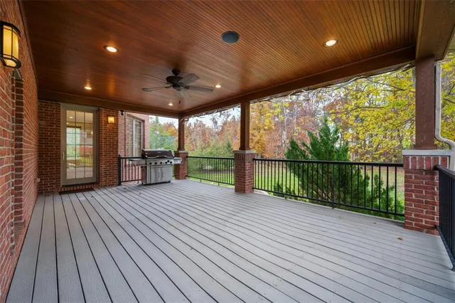 a view of porch with wooden floor