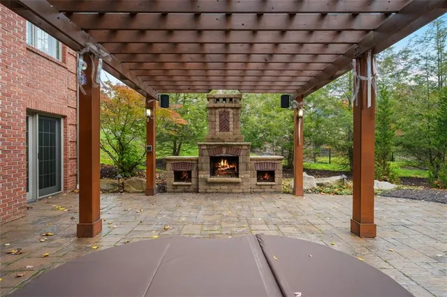 a room with furniture and a fireplace