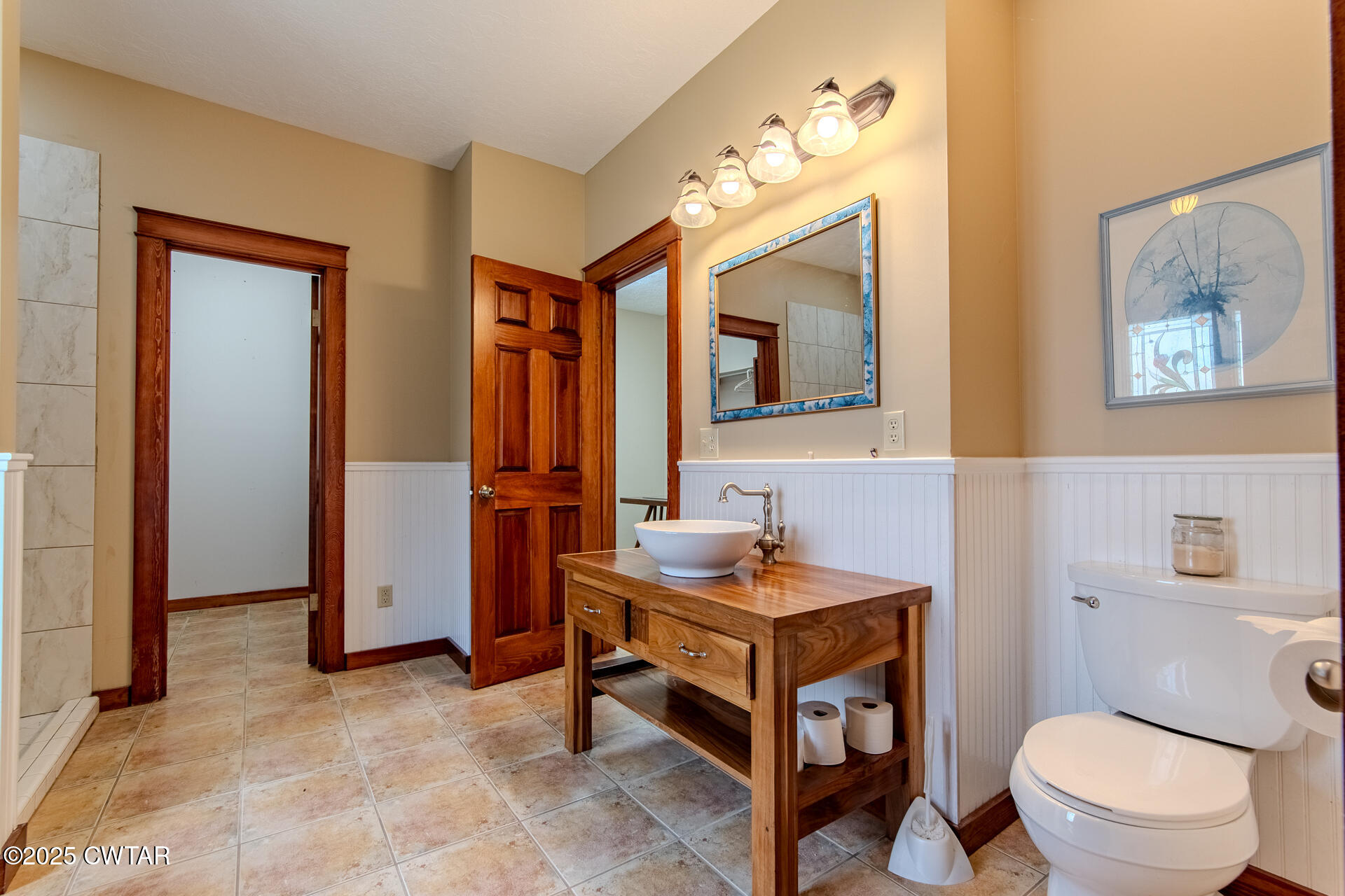 3554 Shades Bridge Road Greenfield, TN 38230 - Photo 26 of 49 a bathroom with a toilet a sink and mirror