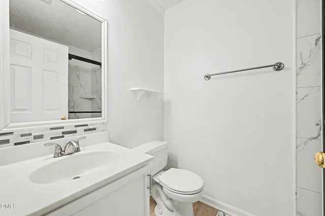 a bathroom with a sink and mirror