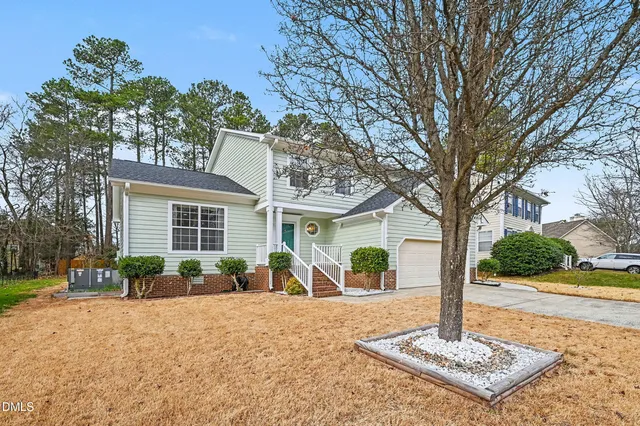 a house with trees in front of it