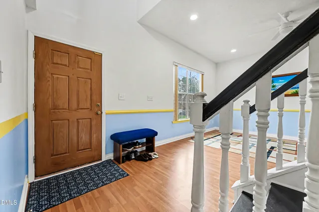 a living room with a couch and a fireplace