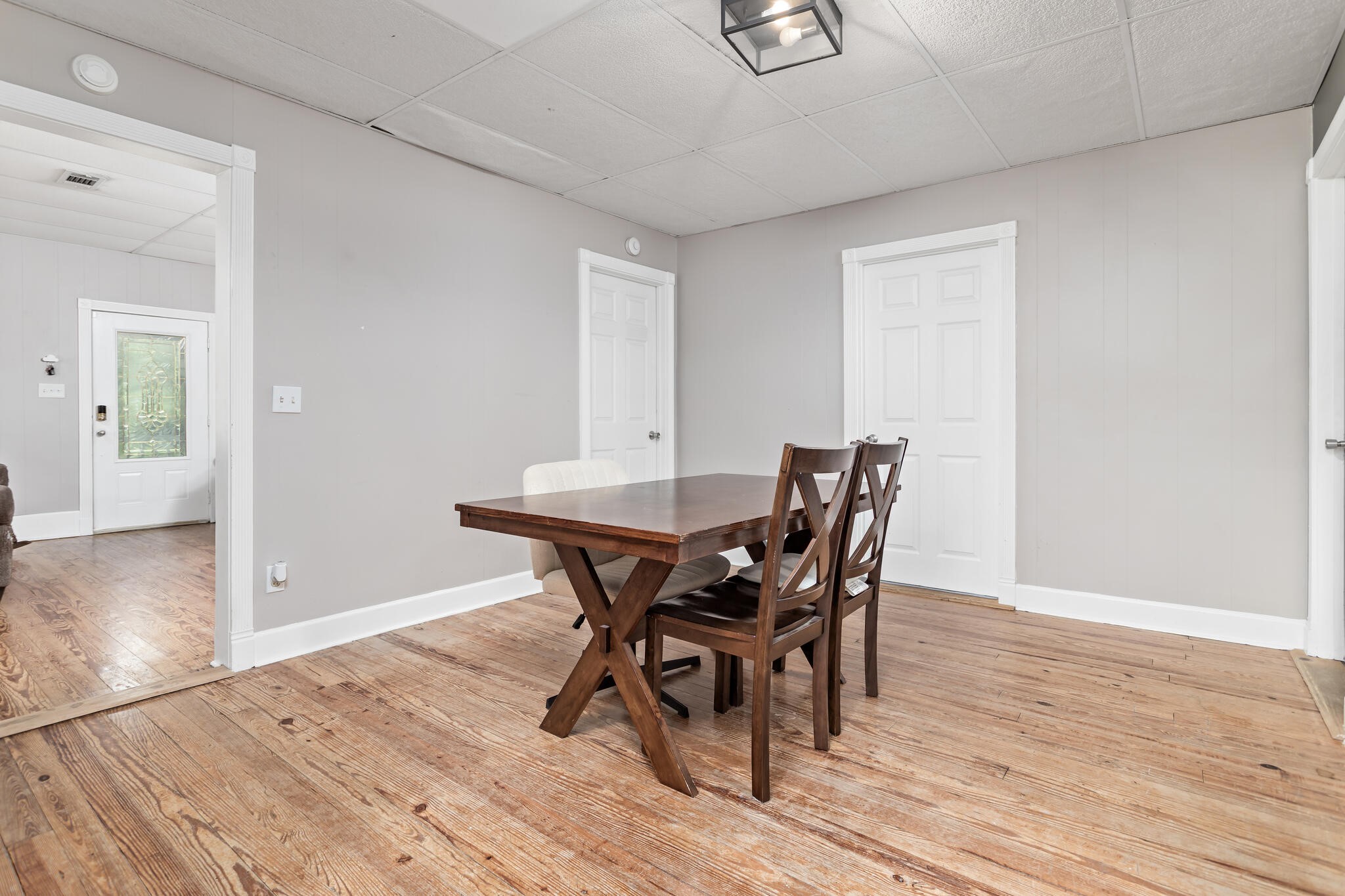 7230 Bythewood Road Beaumont, TX 77713 - Photo 16 of 35 a view of a dining room with furniture and wooden floor