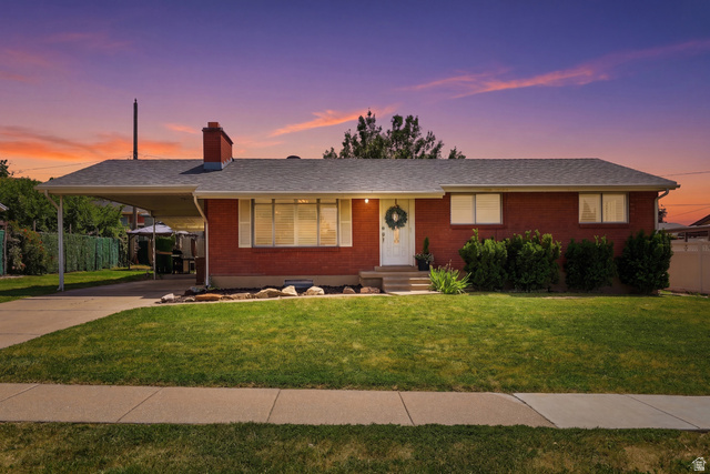 291 West 2300th Street South Bountiful, UT 84010 - Photo 1 of 1 Brick exterior with an attached carport