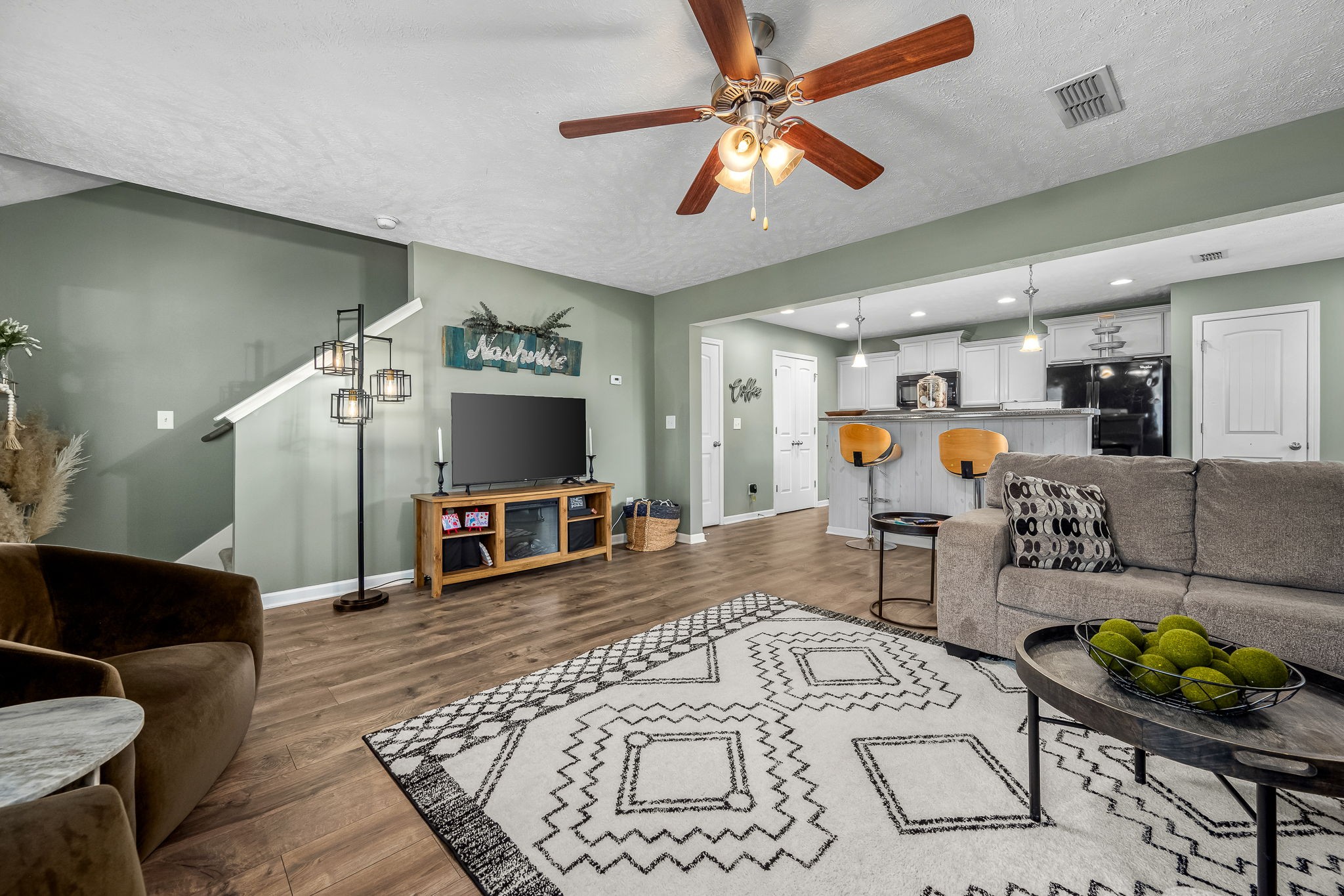 4720 Chelanie Circle Murfreesboro, TN 37129 - Photo 13 of 31 a living room with furniture and a flat screen tv