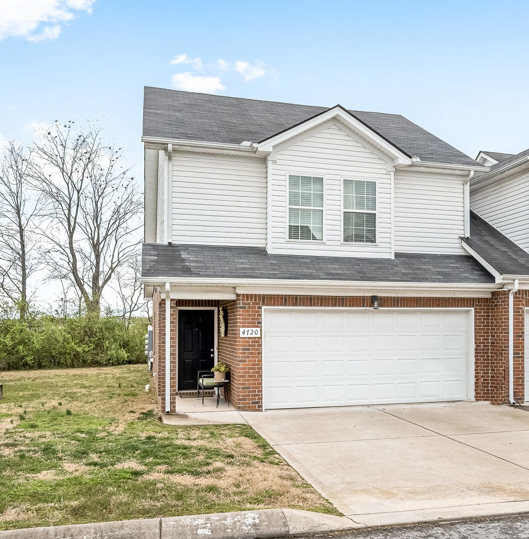 4720 Chelanie Circle Murfreesboro, TN 37129 - Photo 2 of 31 a front view of a house with garden