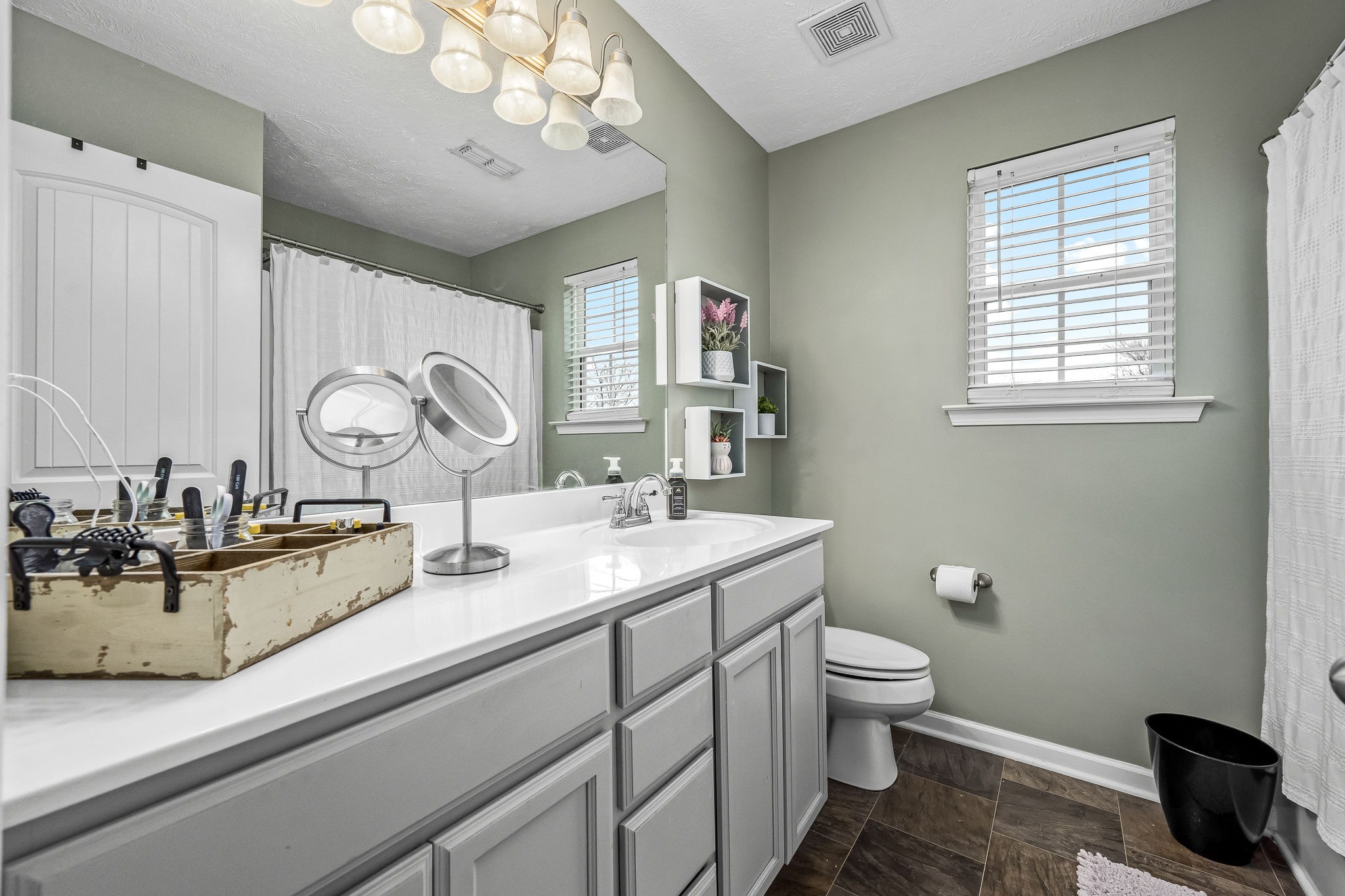 4720 Chelanie Circle Murfreesboro, TN 37129 - Photo 26 of 31 a bathroom with a toilet a sink and mirror