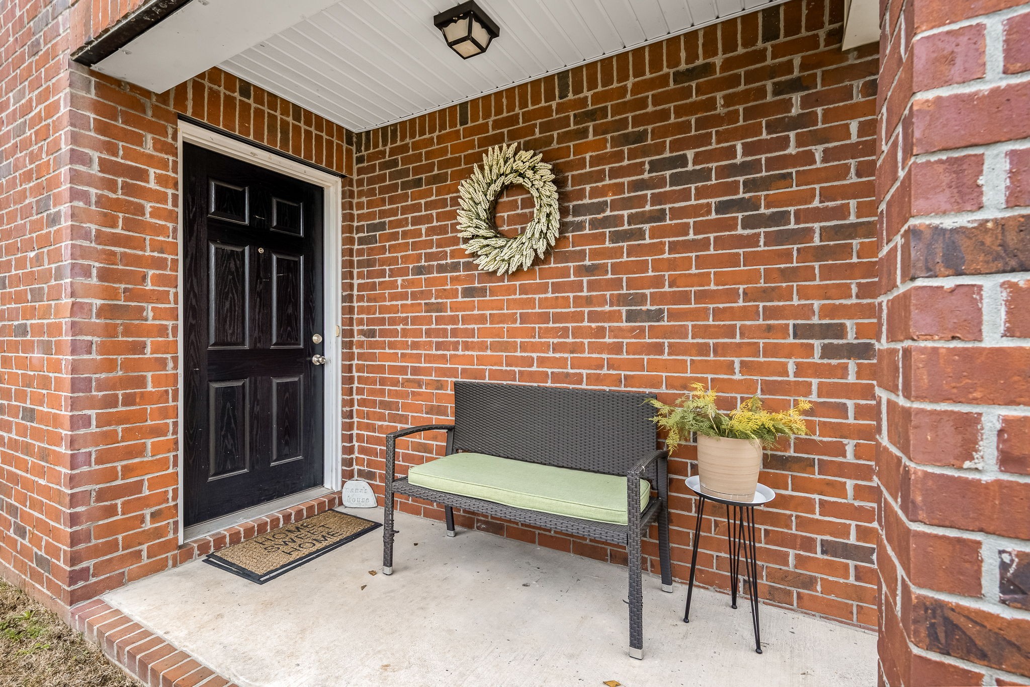4720 Chelanie Circle Murfreesboro, TN 37129 - Photo 4 of 31 a blue bench sitting in front of a building