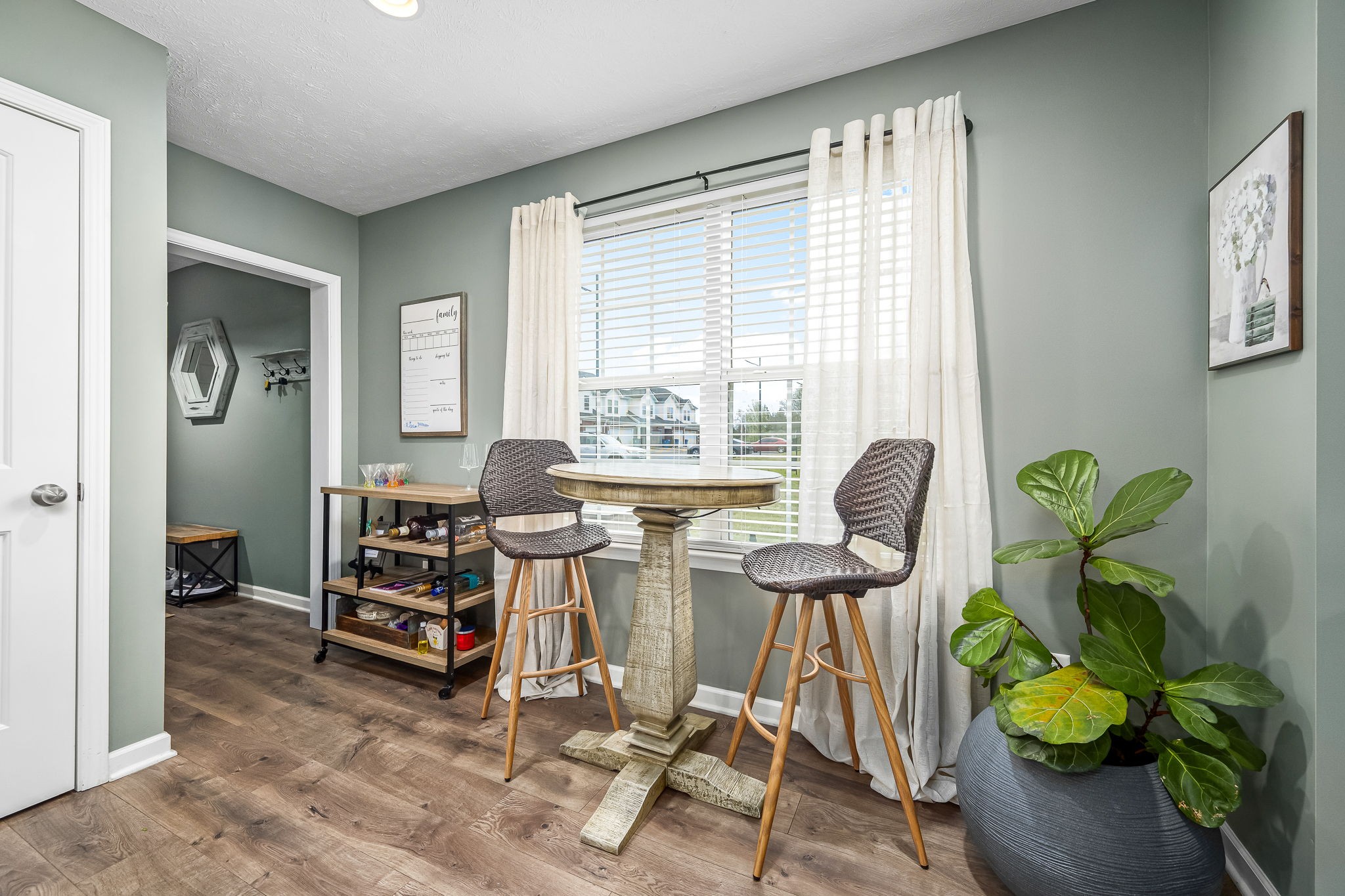 4720 Chelanie Circle Murfreesboro, TN 37129 - Photo 7 of 31 a dining room with furniture and a potted plant