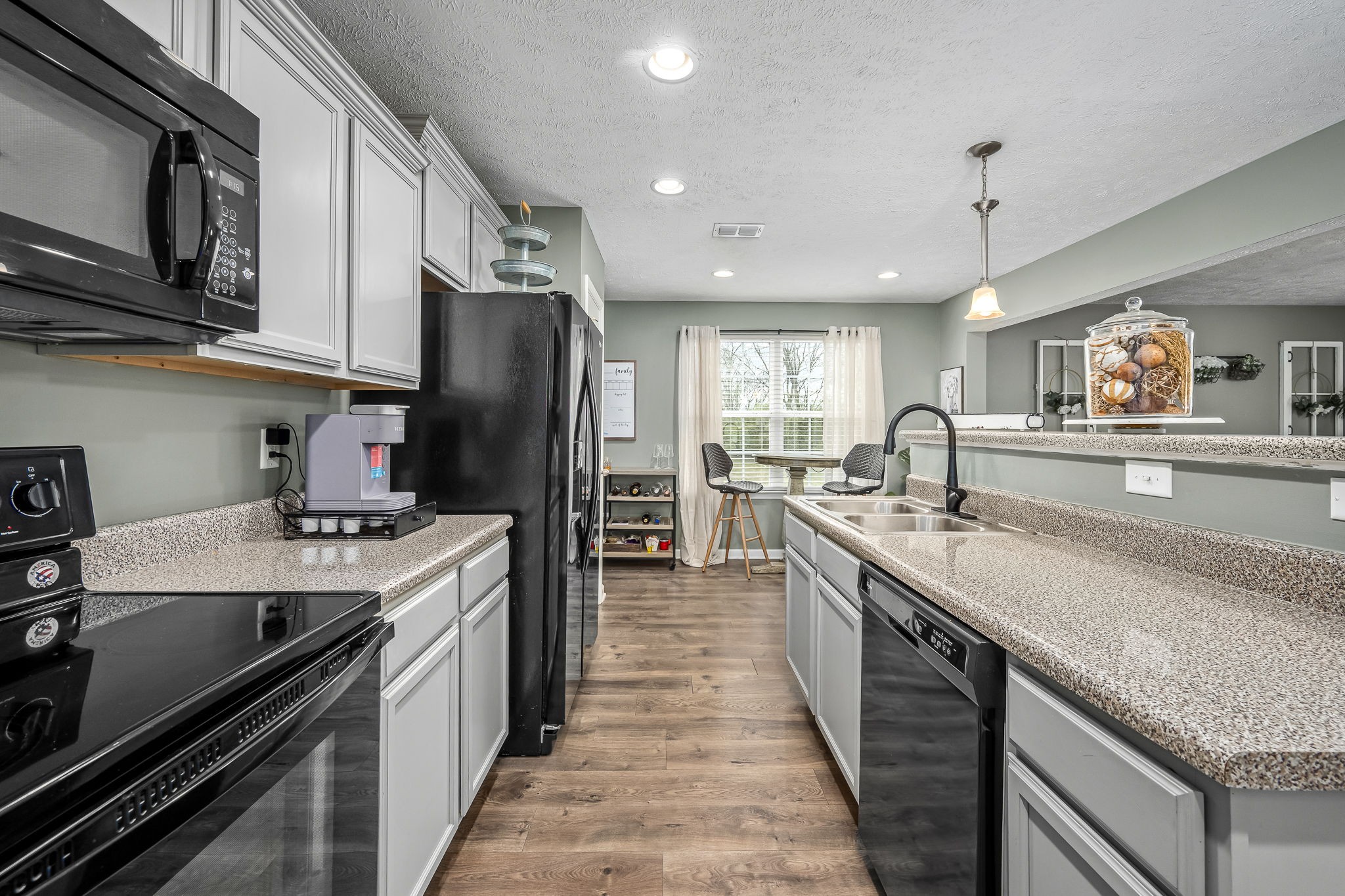 4720 Chelanie Circle Murfreesboro, TN 37129 - Photo 9 of 31 a kitchen with stainless steel appliances granite countertop a sink stove and refrigerator