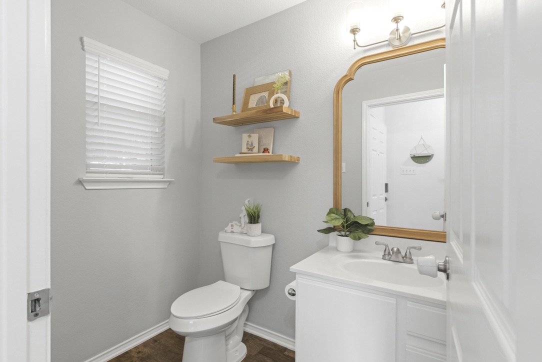 75 Jan Lane Georgetown, TX 78626 - Photo 17 of 32 Half bathroom conveniently located downstairs.