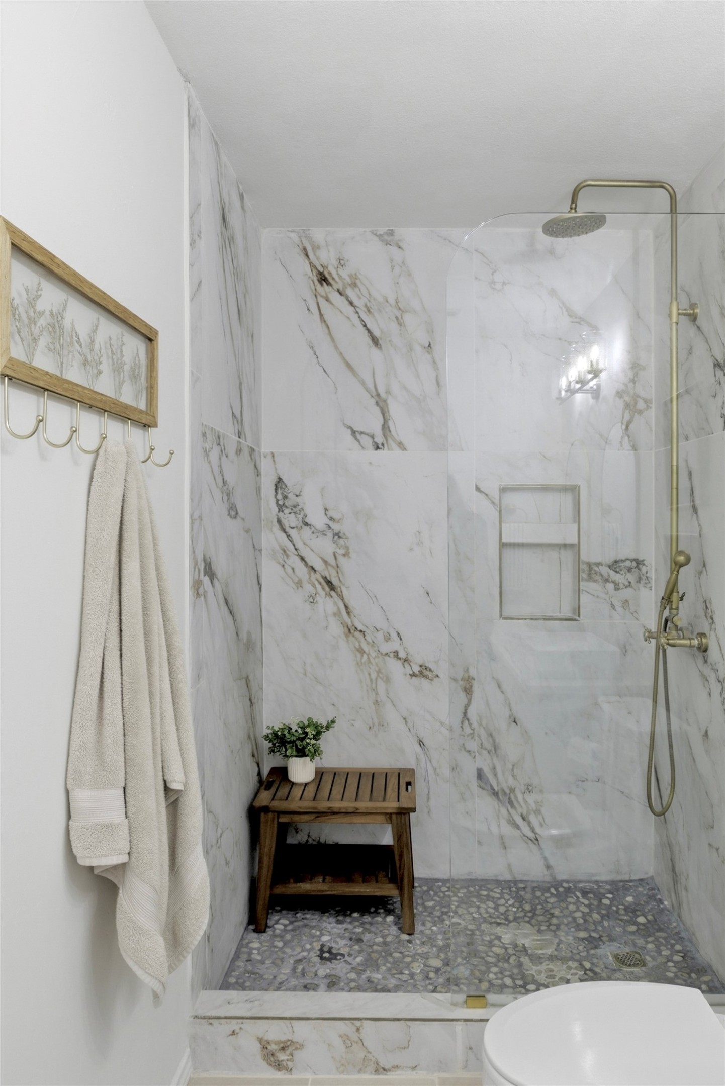 75 Jan Lane Georgetown, TX 78626 - Photo 20 of 32 Updated bathroom featuring large mud set stone shower base, frameless shower glass.