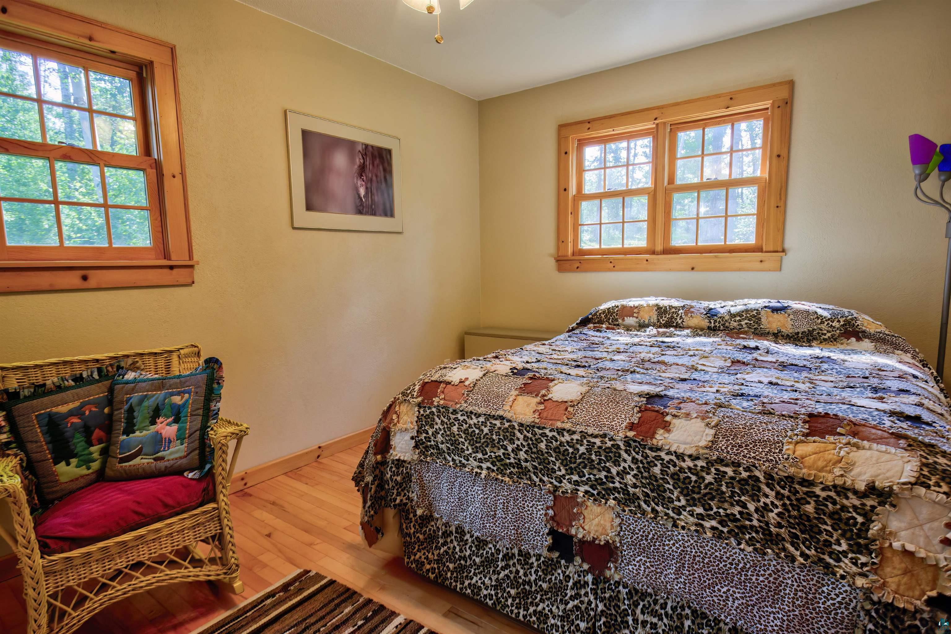 12351 Endless Waters Road Ely, MN 55731 - Photo 30 of 48 Bedroom with hardwood / wood-style floors and baseboards