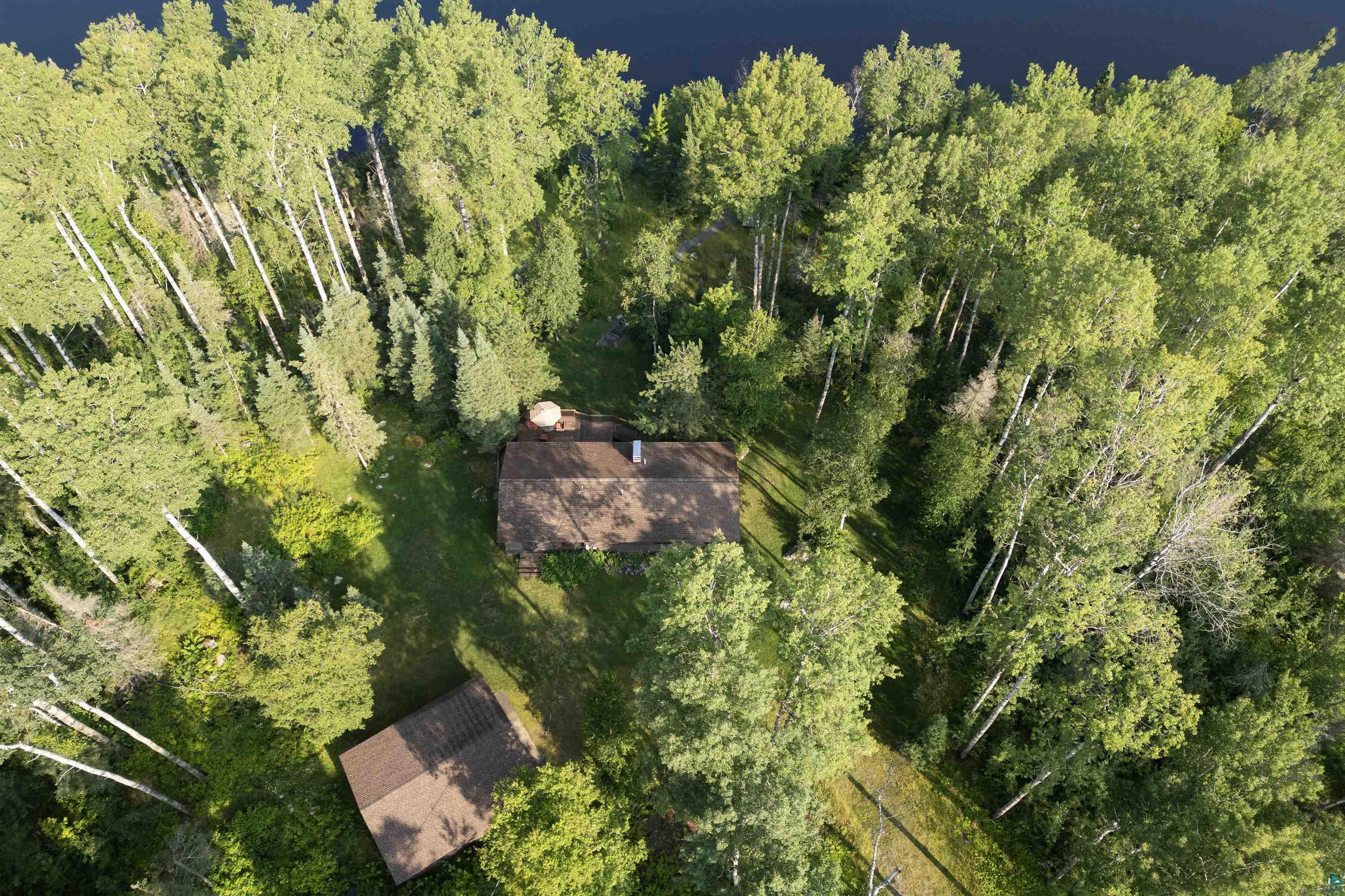 12351 Endless Waters Road Ely, MN 55731 - Photo 38 of 48 View from above of property with a heavily wooded area