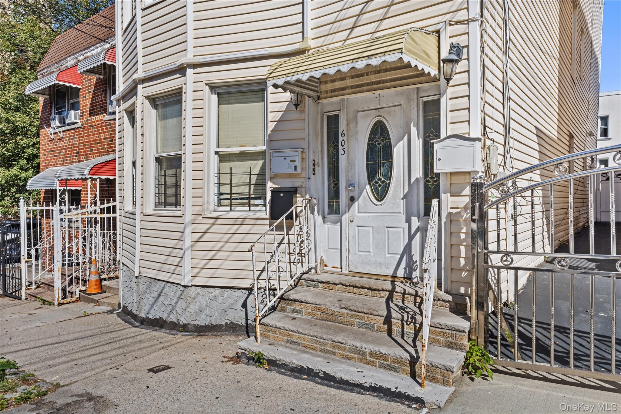 603 East 236th Street Bronx, NY 10466 - Photo 4 of 28 a view of a house with a door
