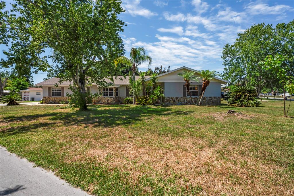 5345 Carlton Road New Port Richey, FL 34652 - Photo 1 of 1 a view of house with outdoor space