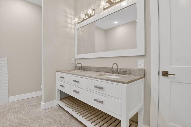 217 20th Street Northeast, Unit 2 Washington, DC 20002 - Photo 11 of 17 Sleek modern double sink with while cabinets
