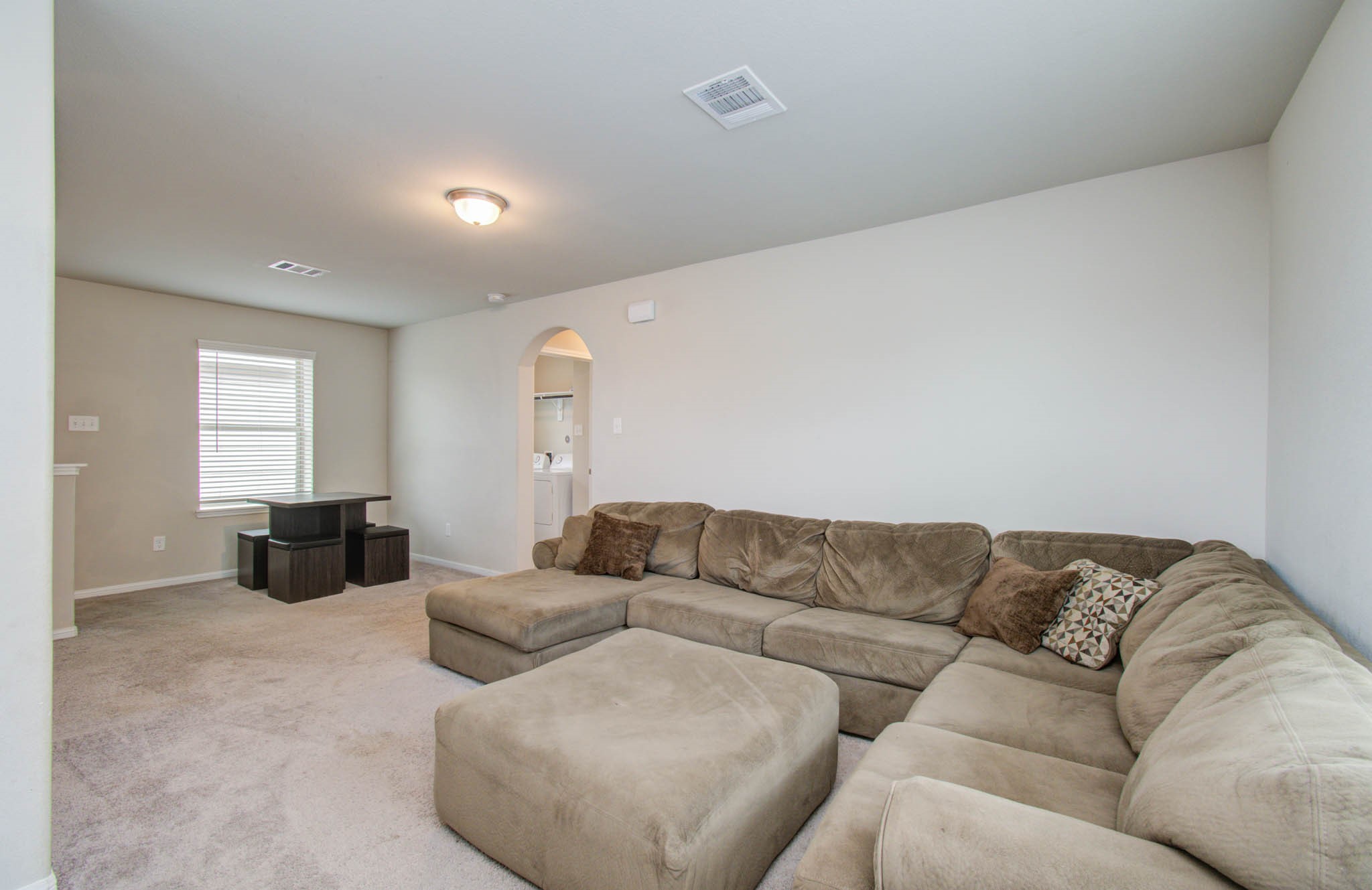 13309 Myrtle Meadows Lane Houston, TX 77048 - Photo 23 of 32 a living room with furniture