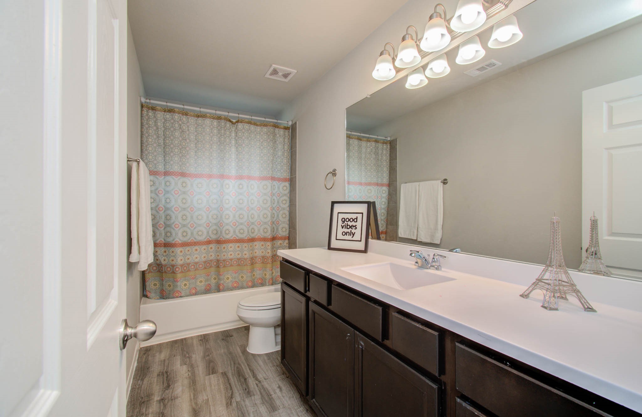 13309 Myrtle Meadows Lane Houston, TX 77048 - Photo 25 of 32 a bathroom with a sink a toilet and shower