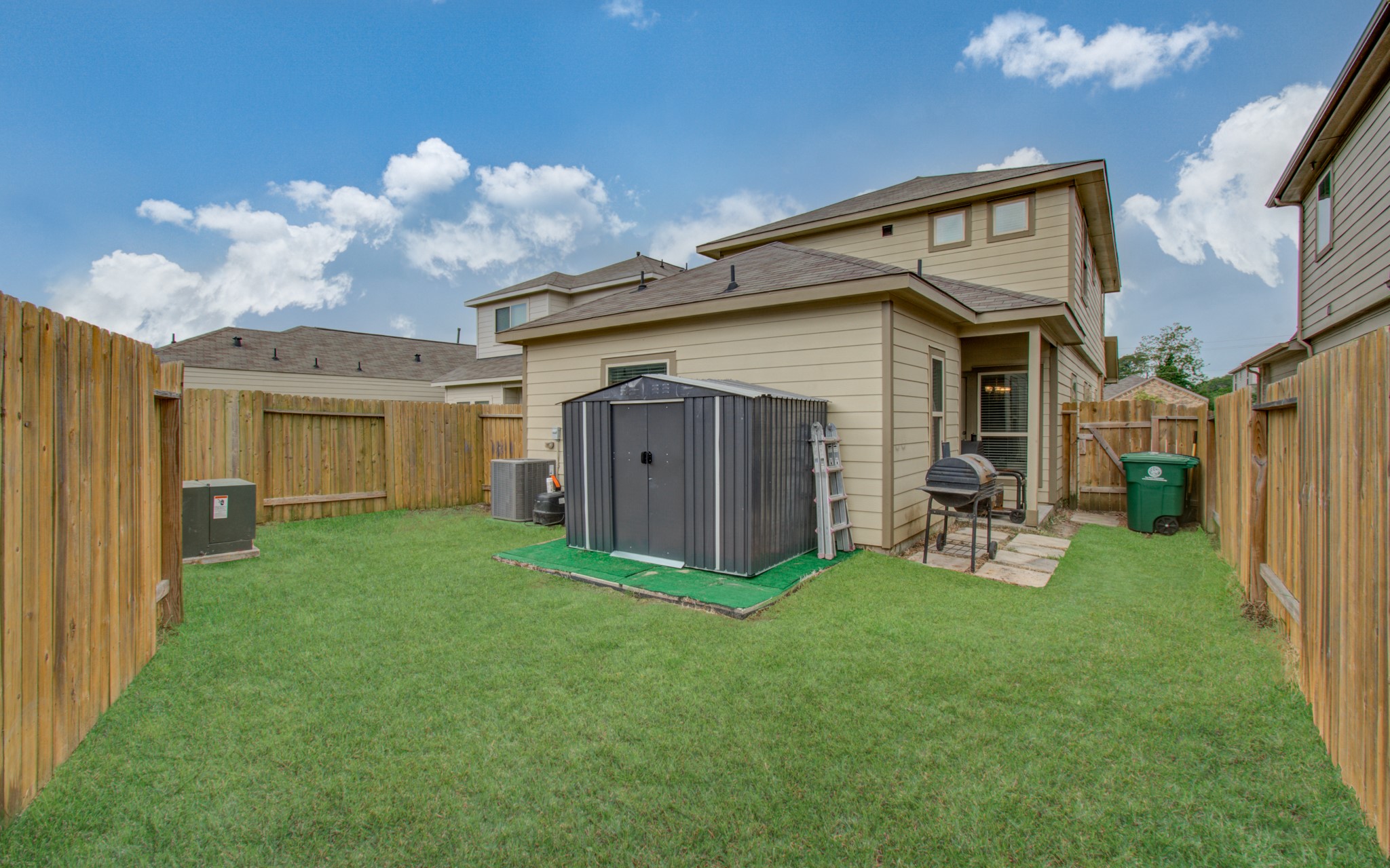 13309 Myrtle Meadows Lane Houston, TX 77048 - Photo 31 of 32 a view of a house with backyard