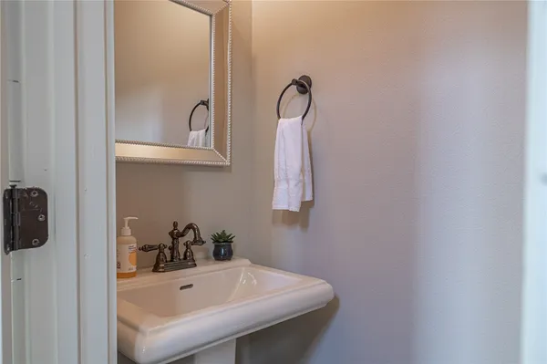 a view of a white building with many windows