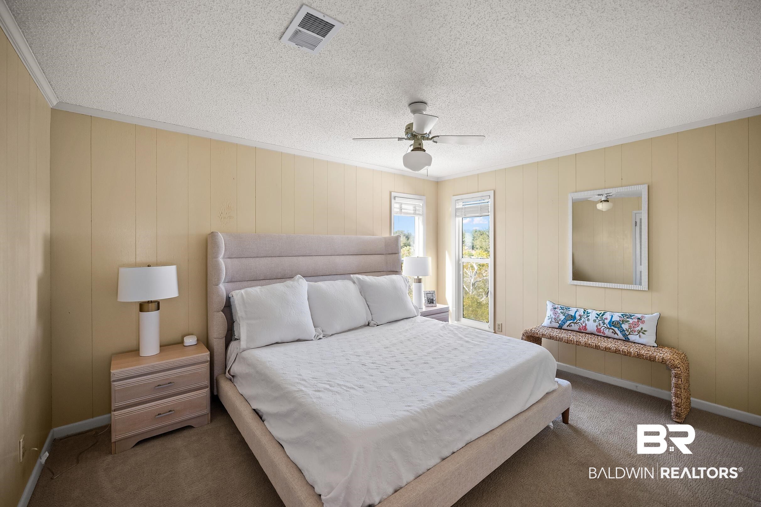 32620 River Road Orange Beach, AL 36561 - Photo 29 of 60 Carpeted bedroom with a ceiling fan, a textured ceiling, and ornamental molding