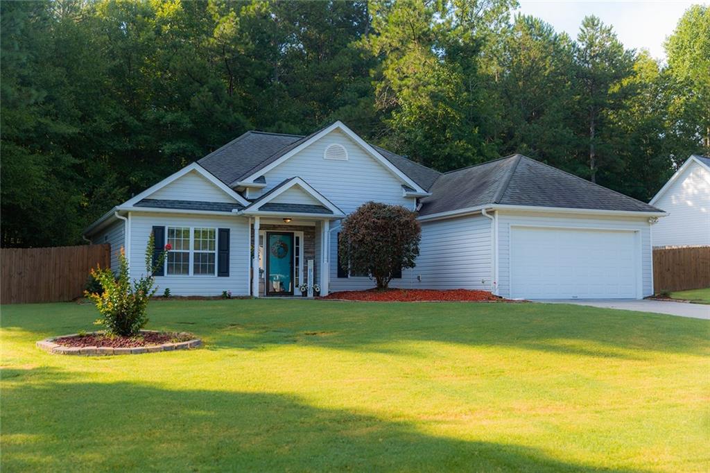 3897 St George Terrace Southwest Powder Springs, GA 30127 - Photo 1 of 1 Beautiful front of home w/ lovely yard & great curb appeal.