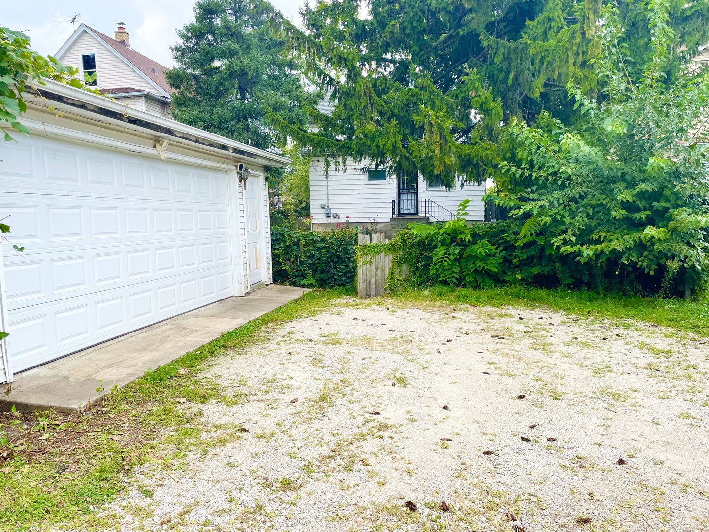 604 Clement Street Joliet, IL 60435 - Photo 14 of 14 a backyard of a house with lots of green space