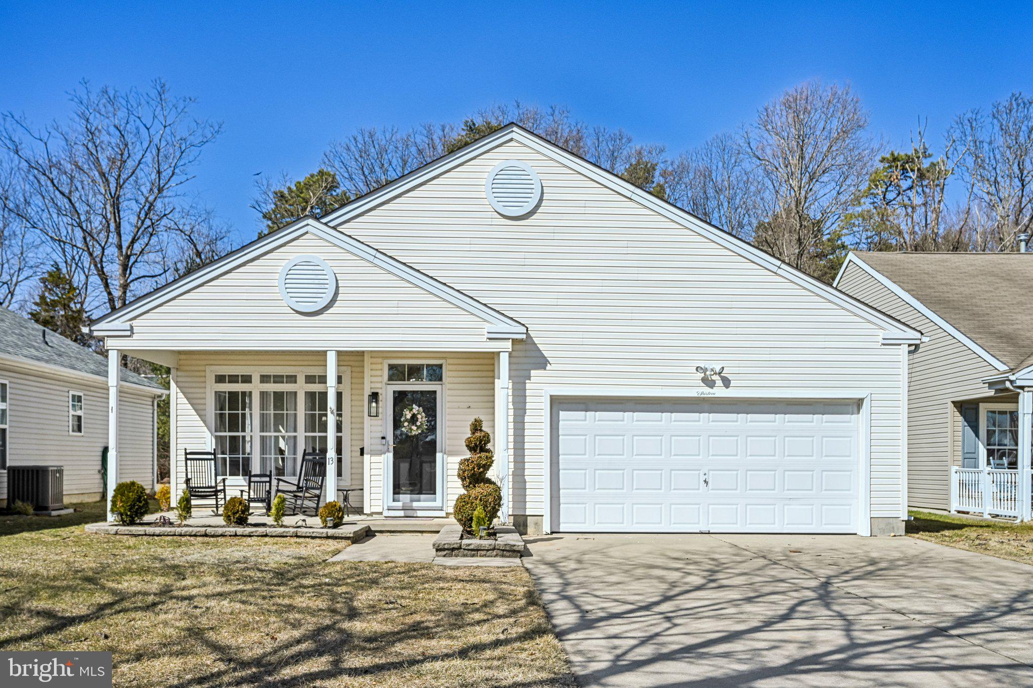 13 Carriage Berlin, NJ 08009 - Photo 1 of 41 a front view of a house with a yard