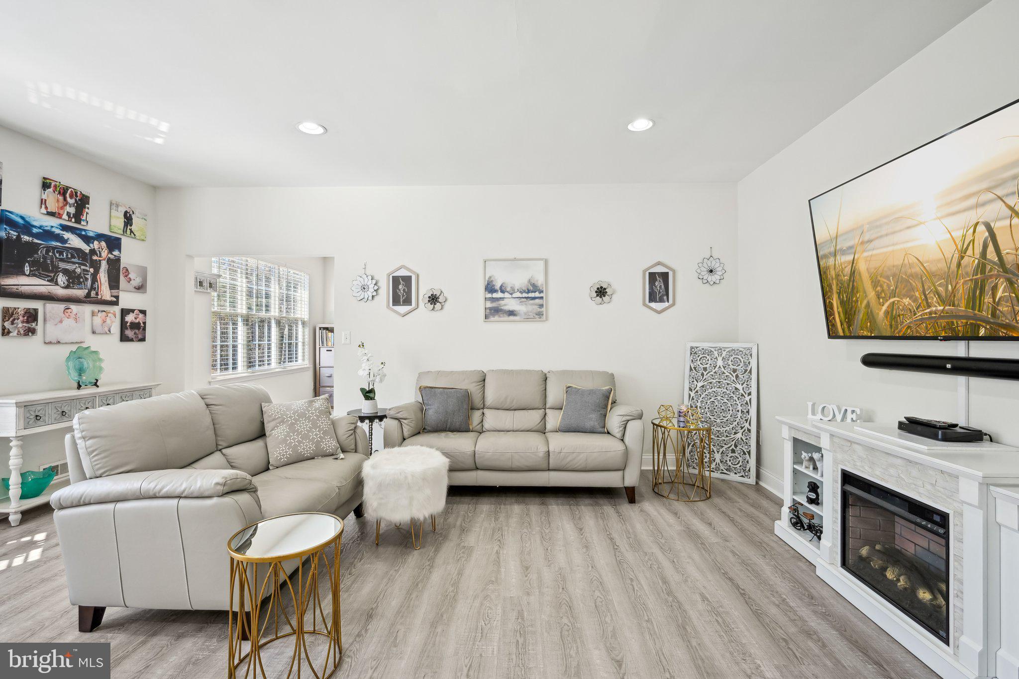13 Carriage Berlin, NJ 08009 - Photo 11 of 41 a living room with furniture and a flat screen tv