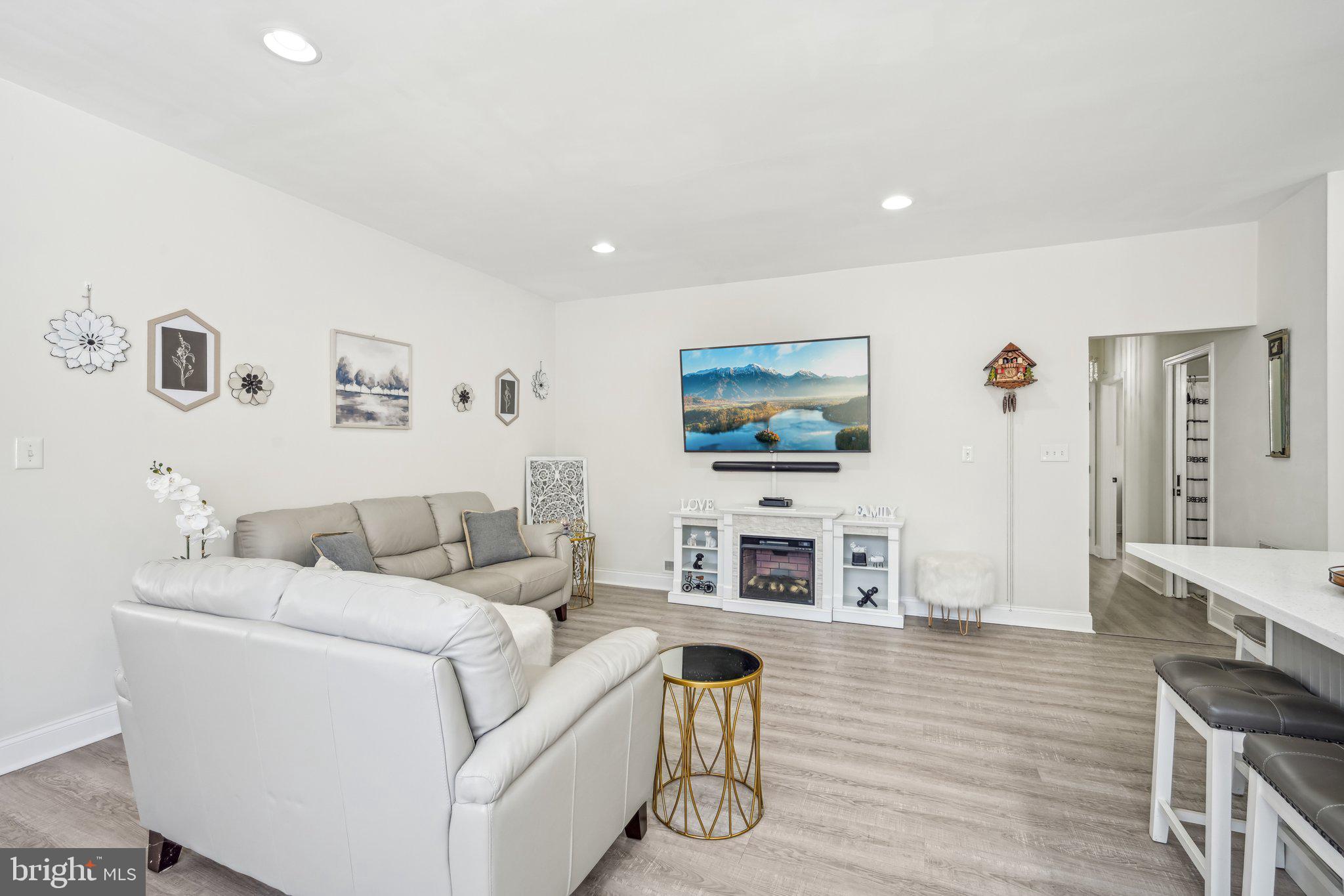 13 Carriage Berlin, NJ 08009 - Photo 12 of 41 a living room with furniture and a flat screen tv