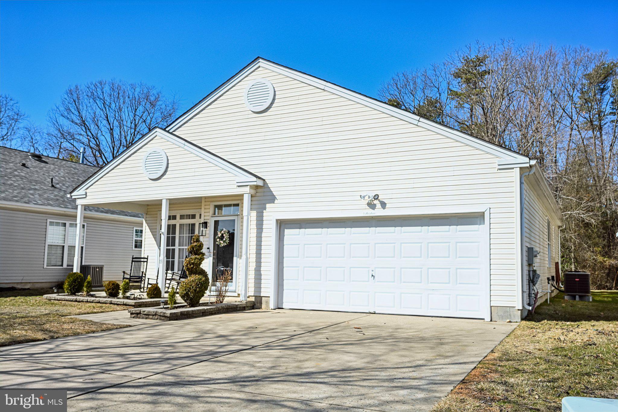 13 Carriage Berlin, NJ 08009 - Photo 2 of 41 a view of a house with a patio