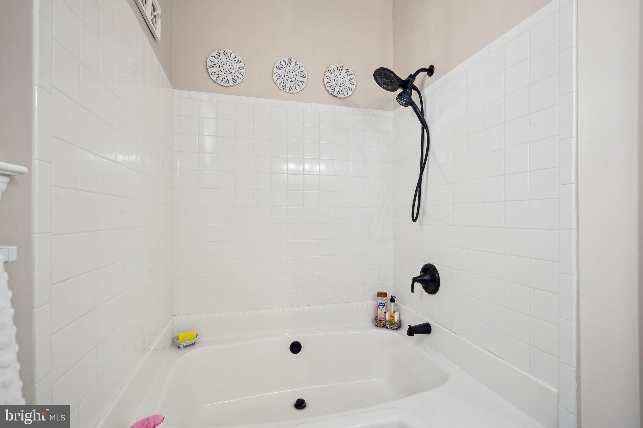 13 Carriage Berlin, NJ 08009 - Photo 27 of 41 a bathroom with a bathtub