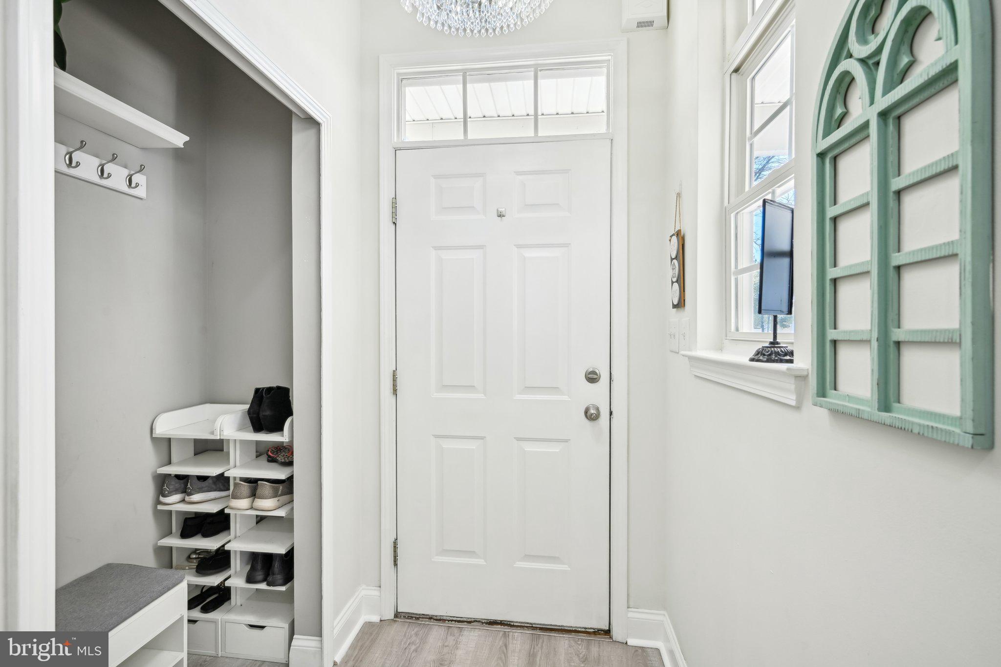 13 Carriage Berlin, NJ 08009 - Photo 6 of 41 a view of an entryway with wooden floor