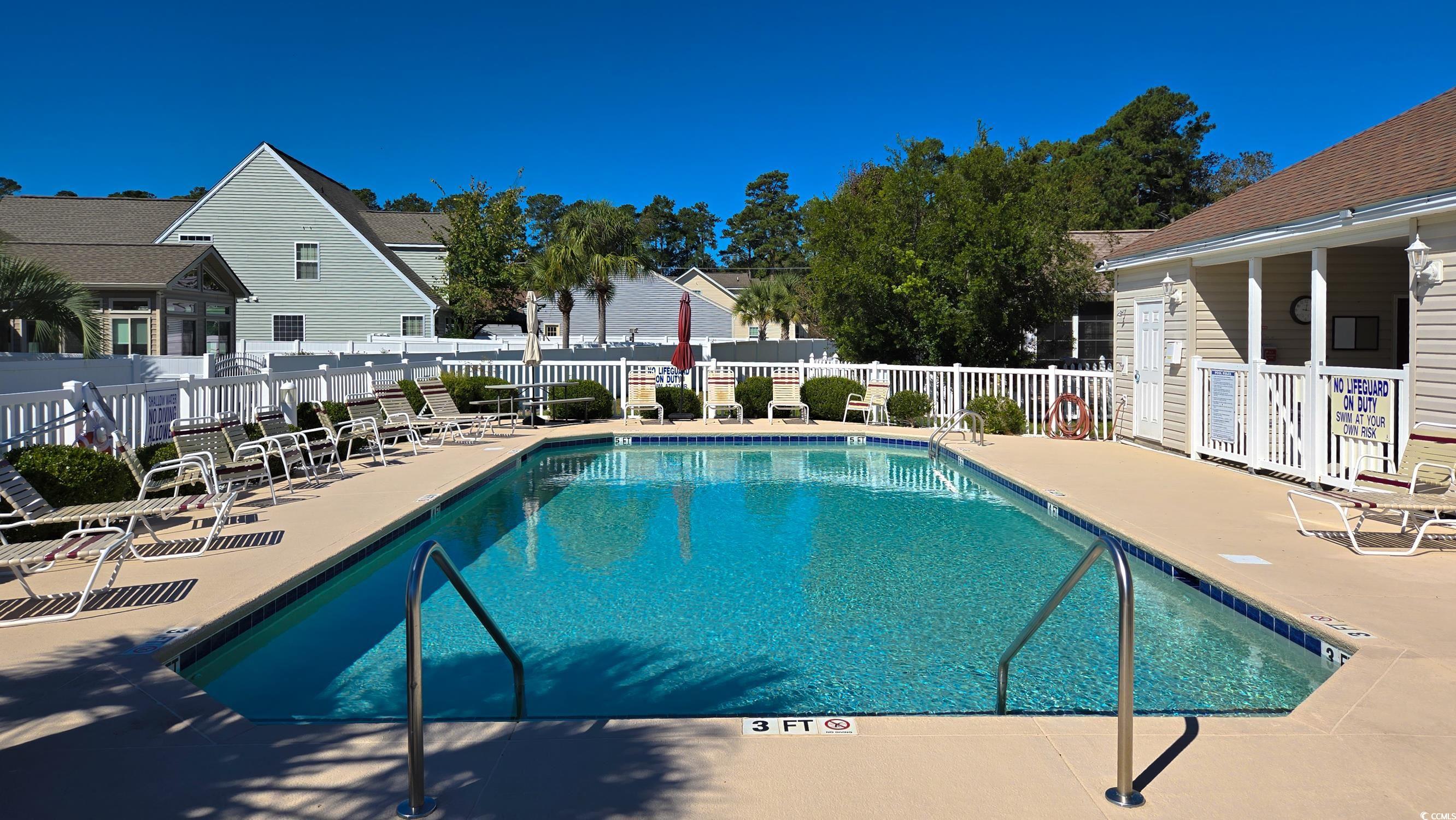 202 Fox Den Drive Murrells Inlet, SC 29576 - Photo 34 of 35 Community pool with a patio area