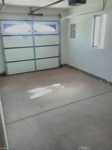 a view of a livingroom with car parked