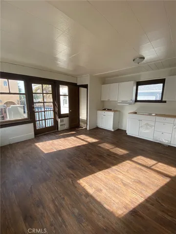 a view of a room that has a window in it