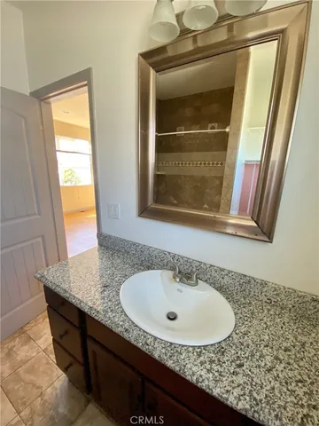 a view of a lake with a house in the background