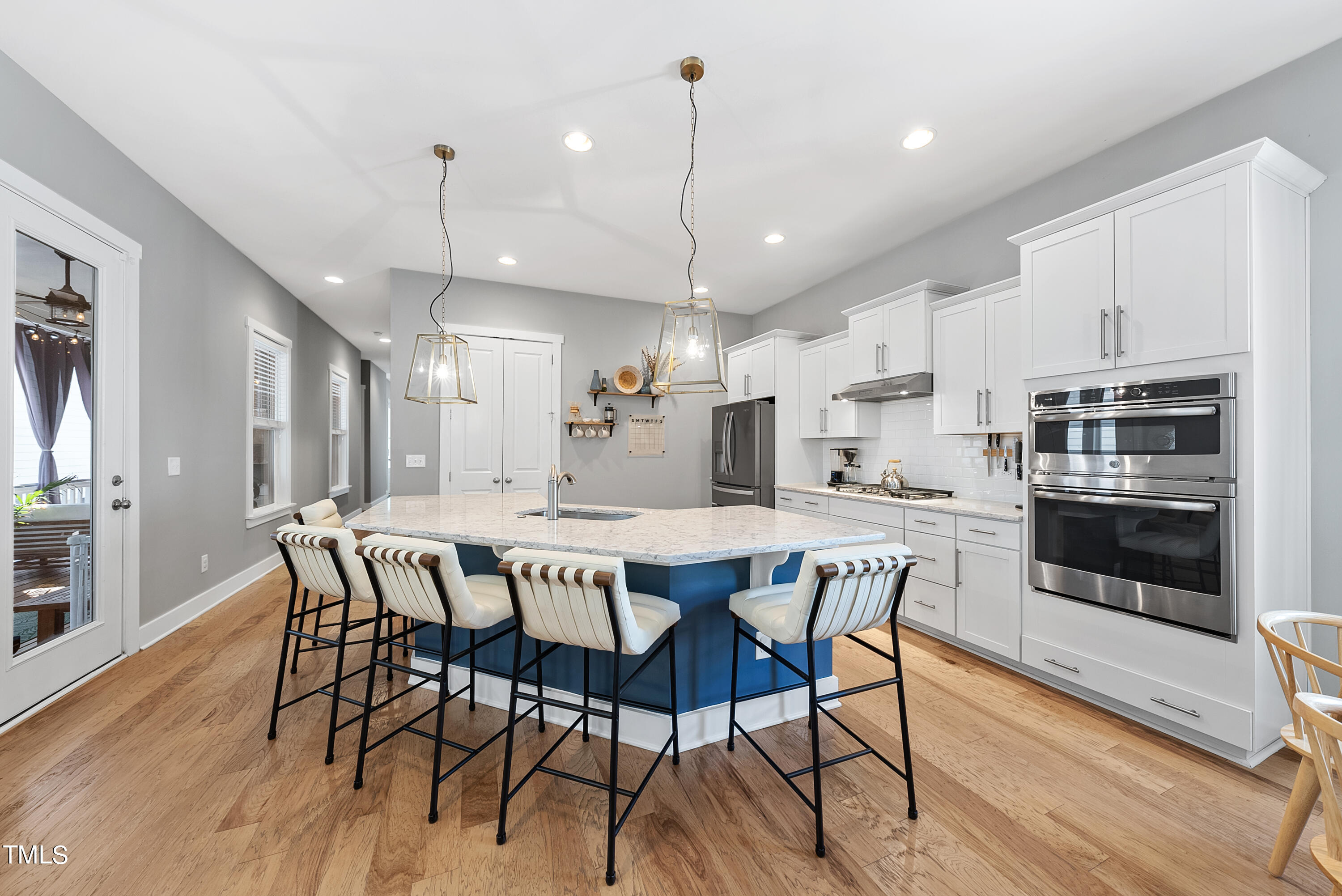 5205 Beckom Street Raleigh, NC 27616 - Photo 9 of 37 Center island is large enough for several additional seats