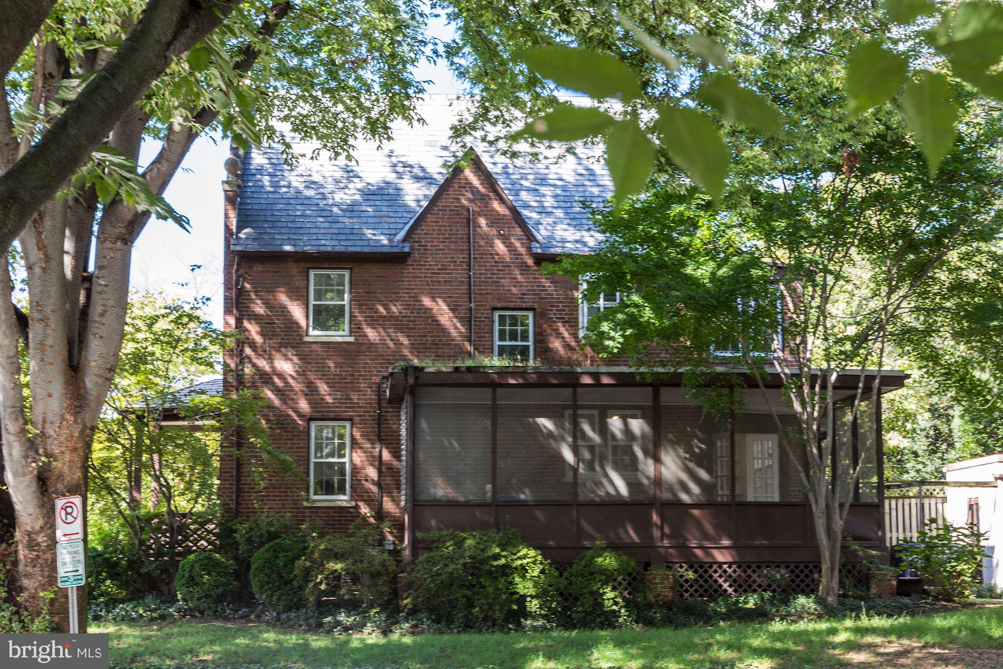 1533 Foxhall Road Northwest Washington, DC 20007 - Photo 2 of 22 Side yard with large screened porch