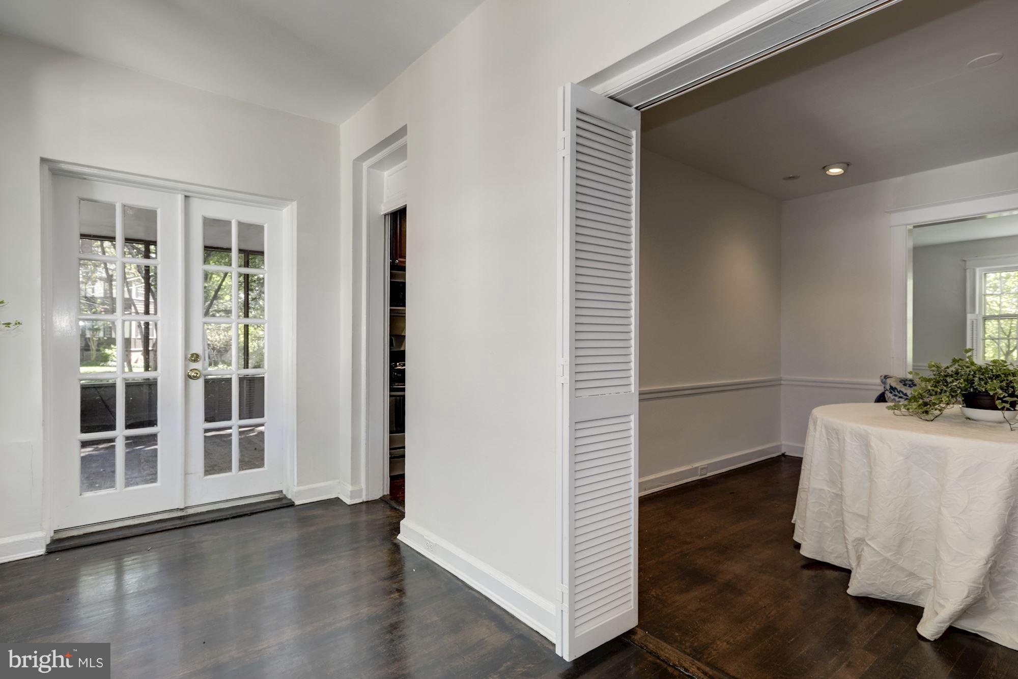 1533 Foxhall Road Northwest Washington, DC 20007 - Photo 14 of 22 French doors leading to screened porch