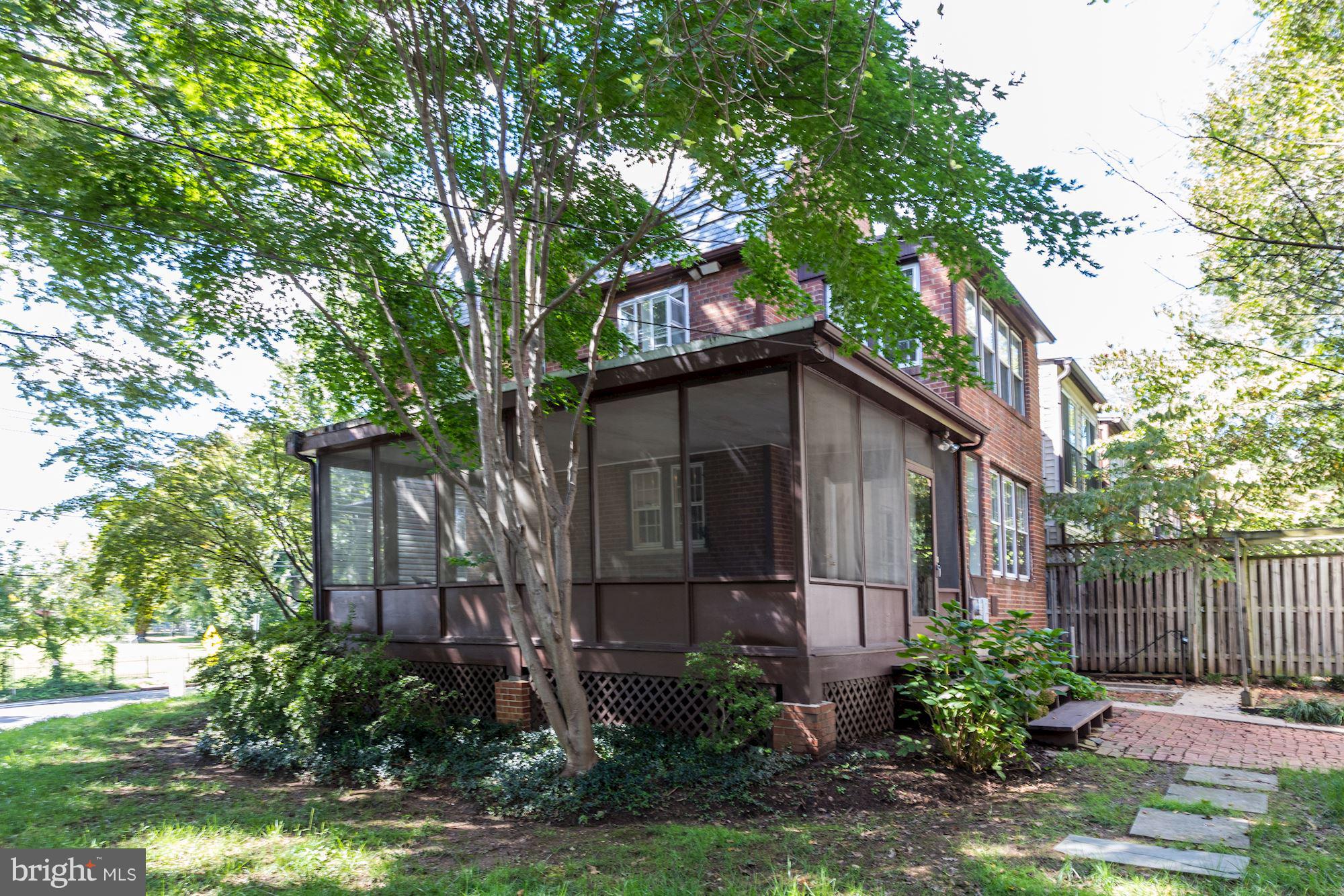 1533 Foxhall Road Northwest Washington, DC 20007 - Photo 4 of 22 large screened porch overlooking garden